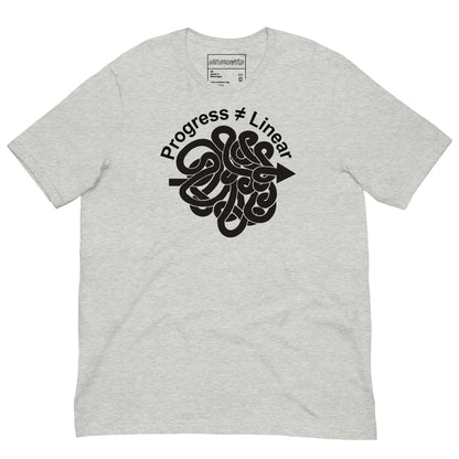 Light gray t-shirt with a bold black graphic of a winding arrow forming a knot, paired with the phrase ‘Progress ≠ Linear’ above the design.