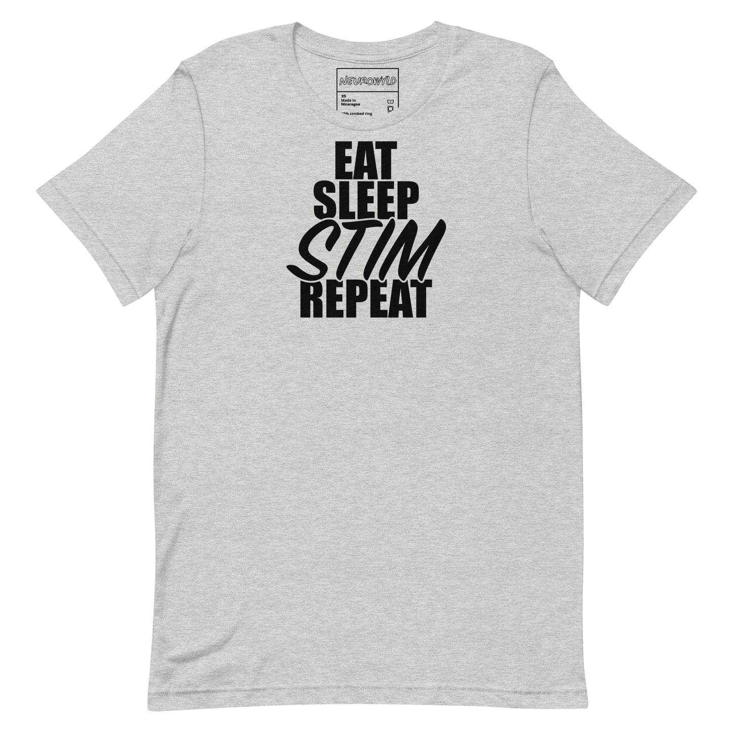 Gray t-shirt with bold black text that reads ‘EAT SLEEP STIM REPEAT,’ celebrating stimming and neurodivergent pride in a minimalist statement design.