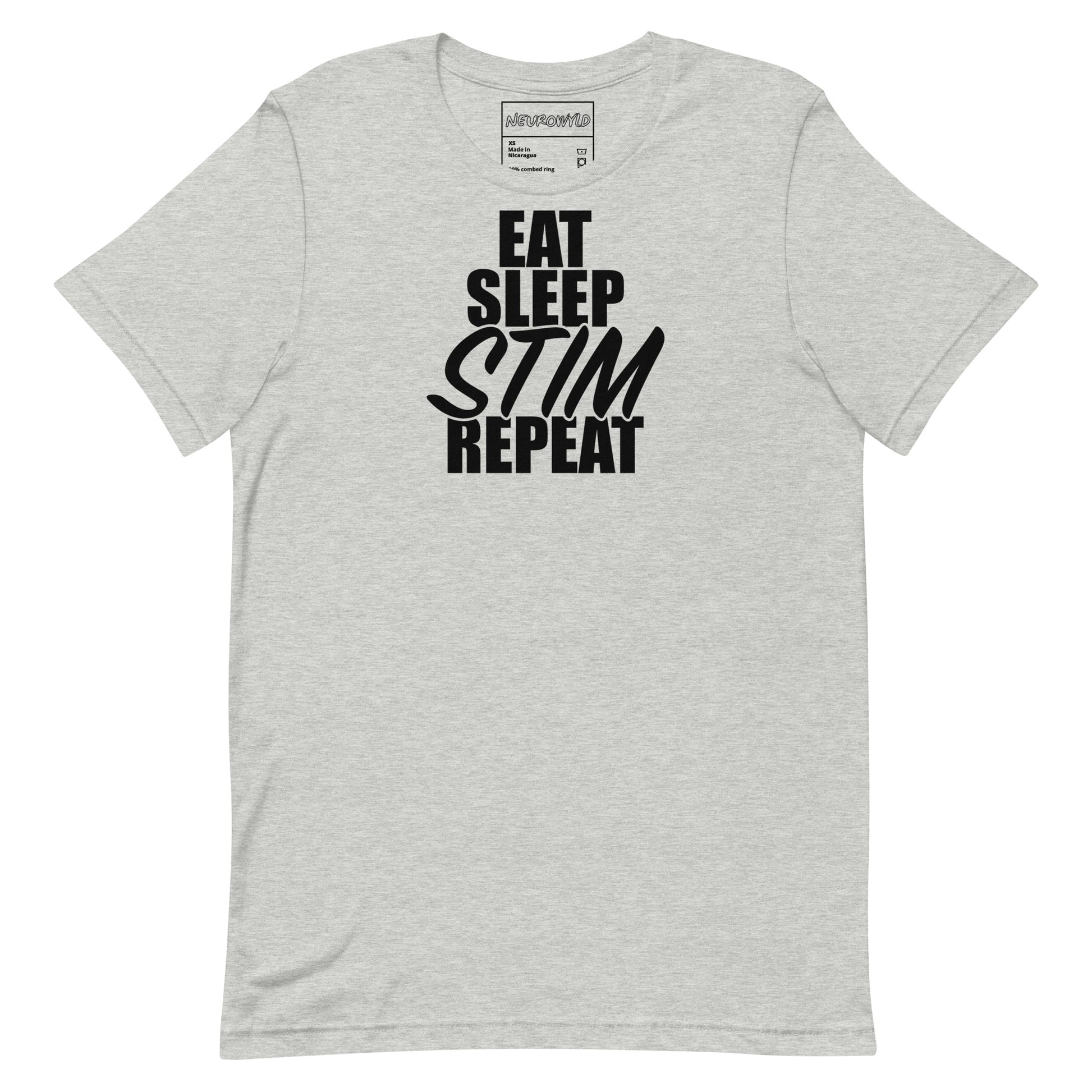 Gray t-shirt with bold black text that reads ‘EAT SLEEP STIM REPEAT,’ celebrating stimming and neurodivergent pride in a minimalist statement design.