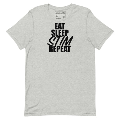 Gray t-shirt with bold black text that reads ‘EAT SLEEP STIM REPEAT,’ celebrating stimming and neurodivergent pride in a minimalist statement design.