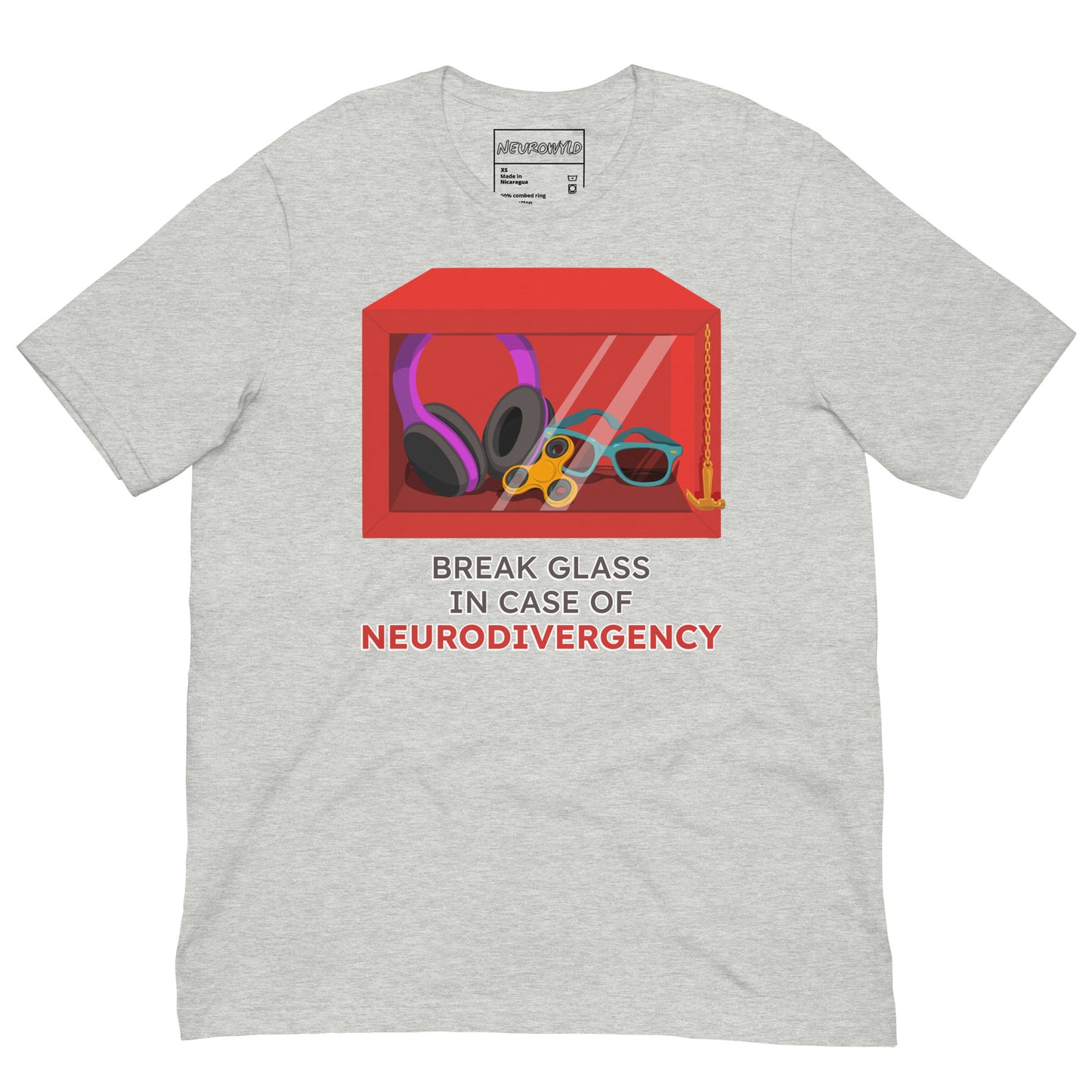 gray t-shirt featuring a red emergency box illustration filled with noise-canceling headphones, a fidget spinner, sunglasses, and a small anchor. Below the box, bold text reads 'Break Glass in Case of Neurodivergency' with 'Neurodivergency' highlighted in red.