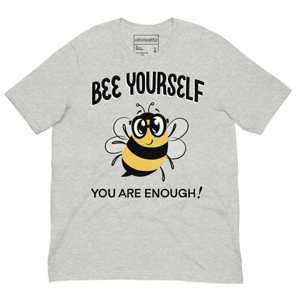 gray t-shirt with a cheerful cartoon bumblebee wearing glasses in the center. Above the bee, bold text reads 'Bee Yourself' and below it says 'You Are Enough!' in black lettering.