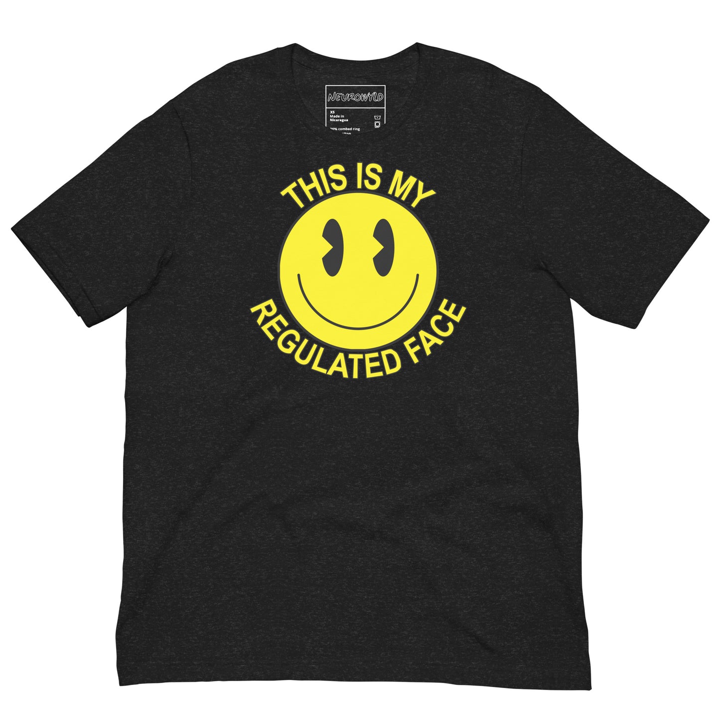 Black t-shirt with a large yellow smiley face graphic. Text above and below the face reads ‘This Is My Regulated Face,’ combining humor and neurodivergent pride.