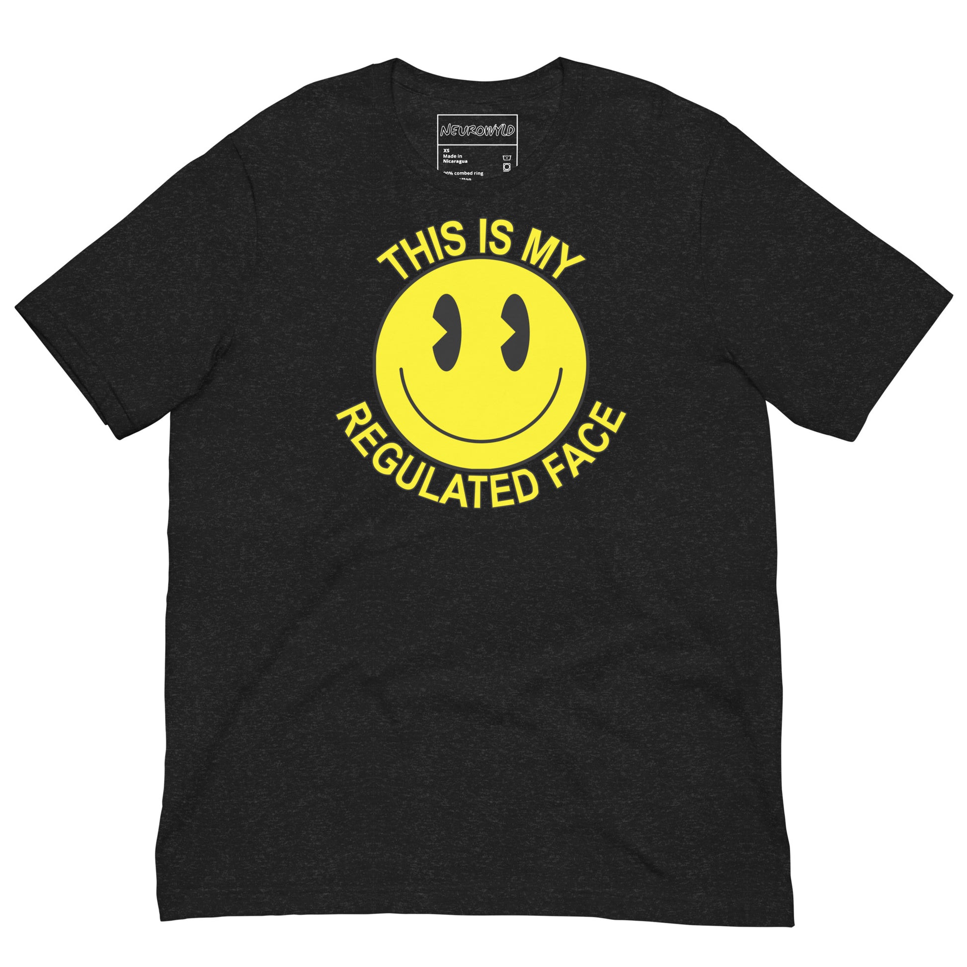 Black t-shirt with a large yellow smiley face graphic. Text above and below the face reads ‘This Is My Regulated Face,’ combining humor and neurodivergent pride.