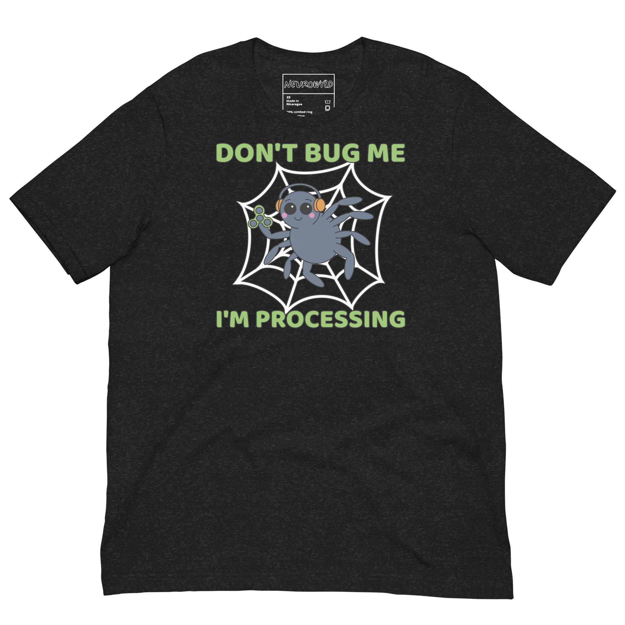 black t-shirt featuring a cartoon spider sitting in a web, wearing orange headphones and holding a green fidget spinner. Above the spider, bold green text reads 'Don't Bug Me,' and below it says 'I'm Processing'.