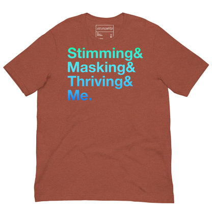 clay t-shirt with bold gradient text in teal-to-blue reading: ‘Stimming& Masking& Thriving& Me.’ Minimalist design celebrating neurodivergent experiences.