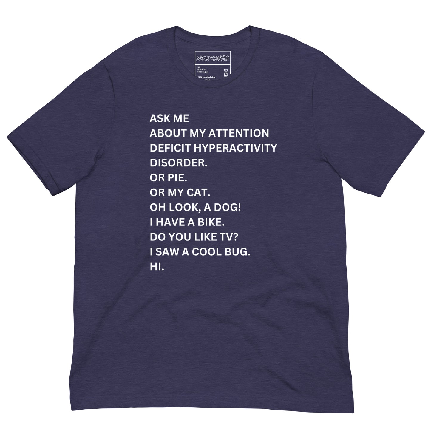 purple t-shirt with white text in a playful, scattered style that reads: 'ASK ME ABOUT MY ATTENTION DEFICIT HYPERACTIVITY DISORDER. OR PIE. OR MY CAT. OH LOOK, A DOG! I HAVE A BIKE. DO YOU LIKE TV? I SAW A COOL BUG. HI.'