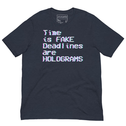 Navy t-shirt with glitch-style pastel text that reads 'Time is FAKE, Deadlines are HOLOGRAMS,' designed with a retro digital aesthetic.
