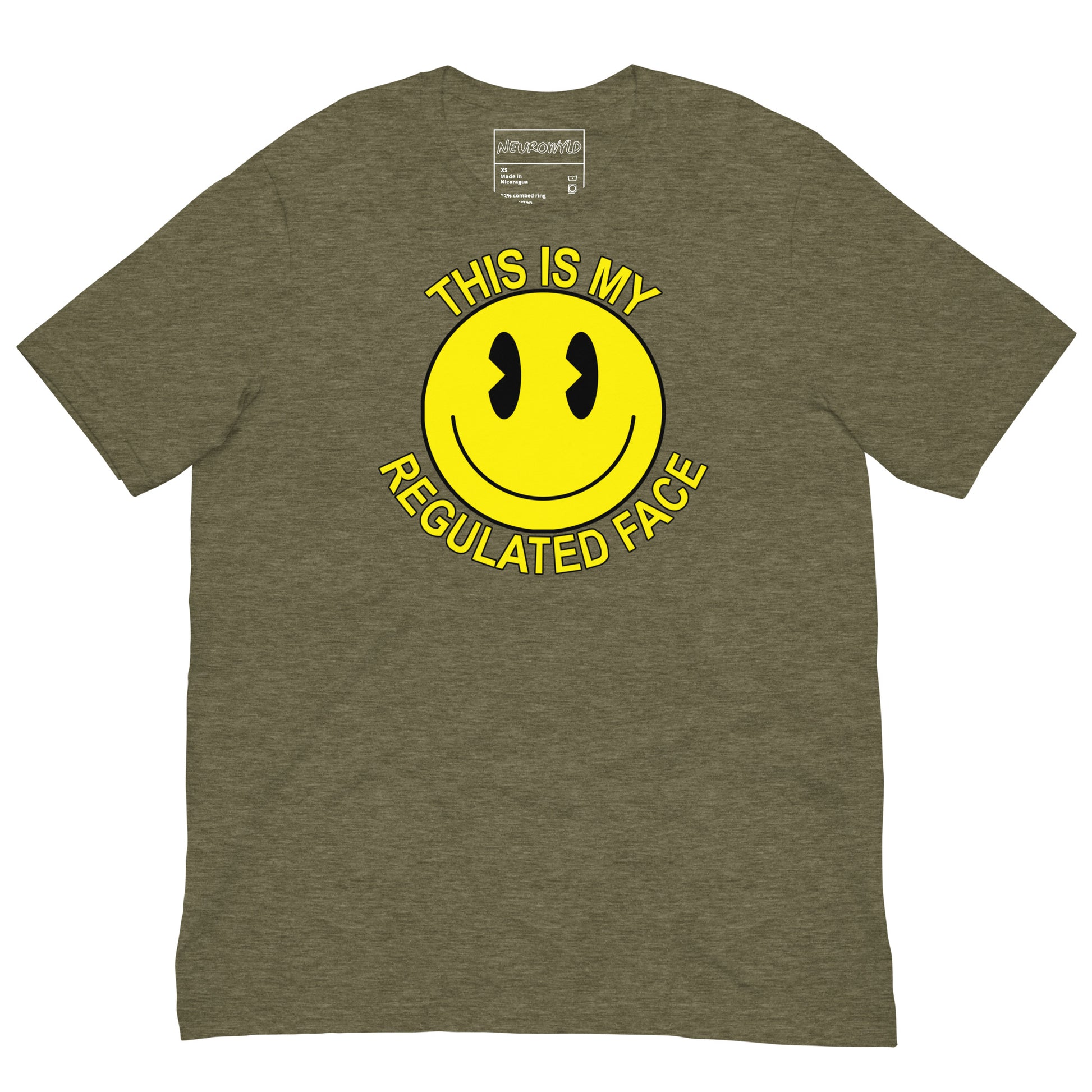 Green t-shirt with a large yellow smiley face graphic. Text above and below the face reads ‘This Is My Regulated Face,’ combining humor and neurodivergent pride.