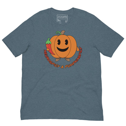 slate blue t-shirt with a smiling pumpkin holding a red chili pepper. Below the design, playful text reads: 'Neurospicy & Pumpkinspicy.'