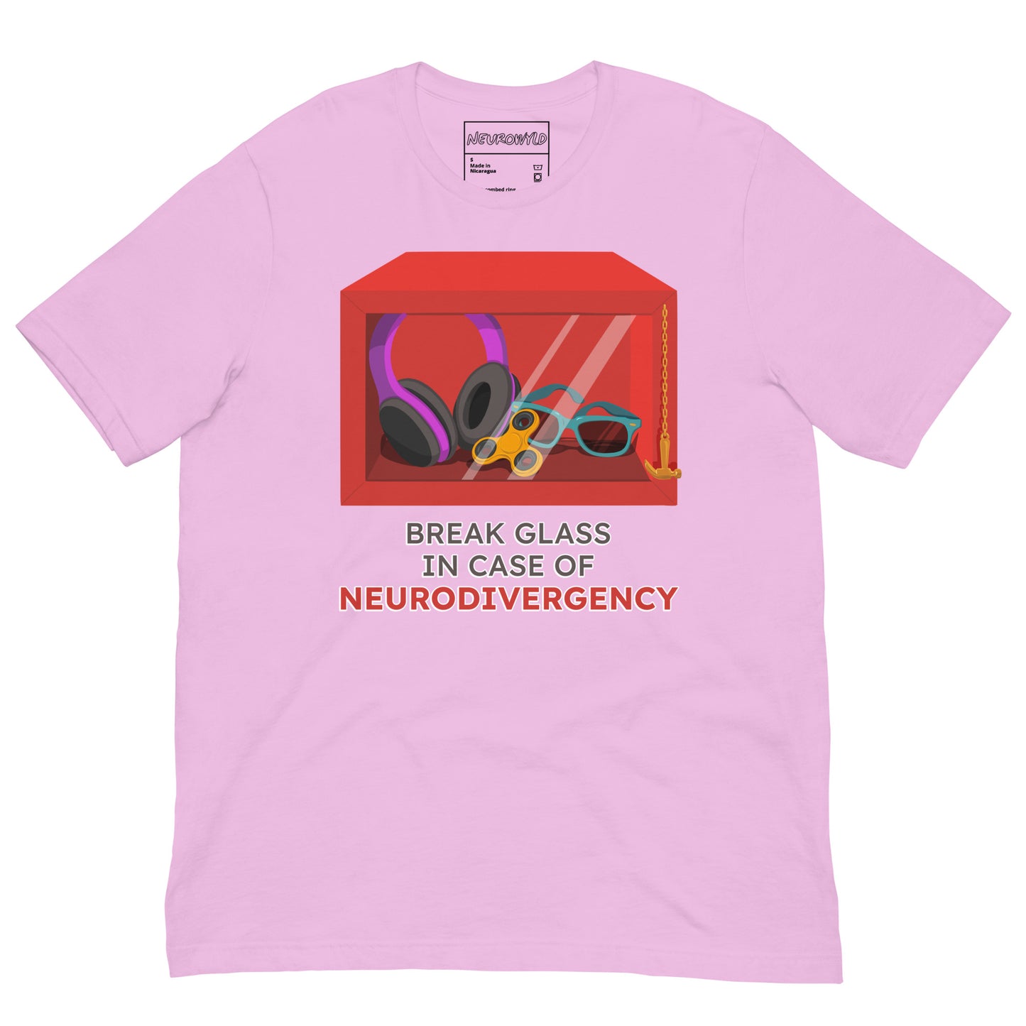 pink t-shirt featuring a red emergency box illustration filled with noise-canceling headphones, a fidget spinner, sunglasses, and a small anchor. Below the box, bold text reads 'Break Glass in Case of Neurodivergency' with 'Neurodivergency' highlighted in red.
