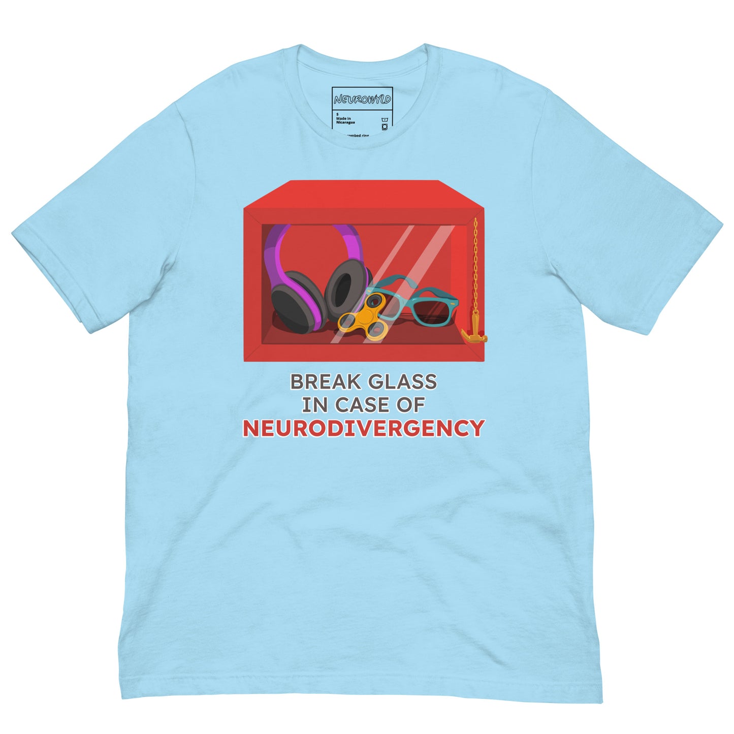 blue t-shirt featuring a red emergency box illustration filled with noise-canceling headphones, a fidget spinner, sunglasses, and a small anchor. Below the box, bold text reads 'Break Glass in Case of Neurodivergency' with 'Neurodivergency' highlighted in red.