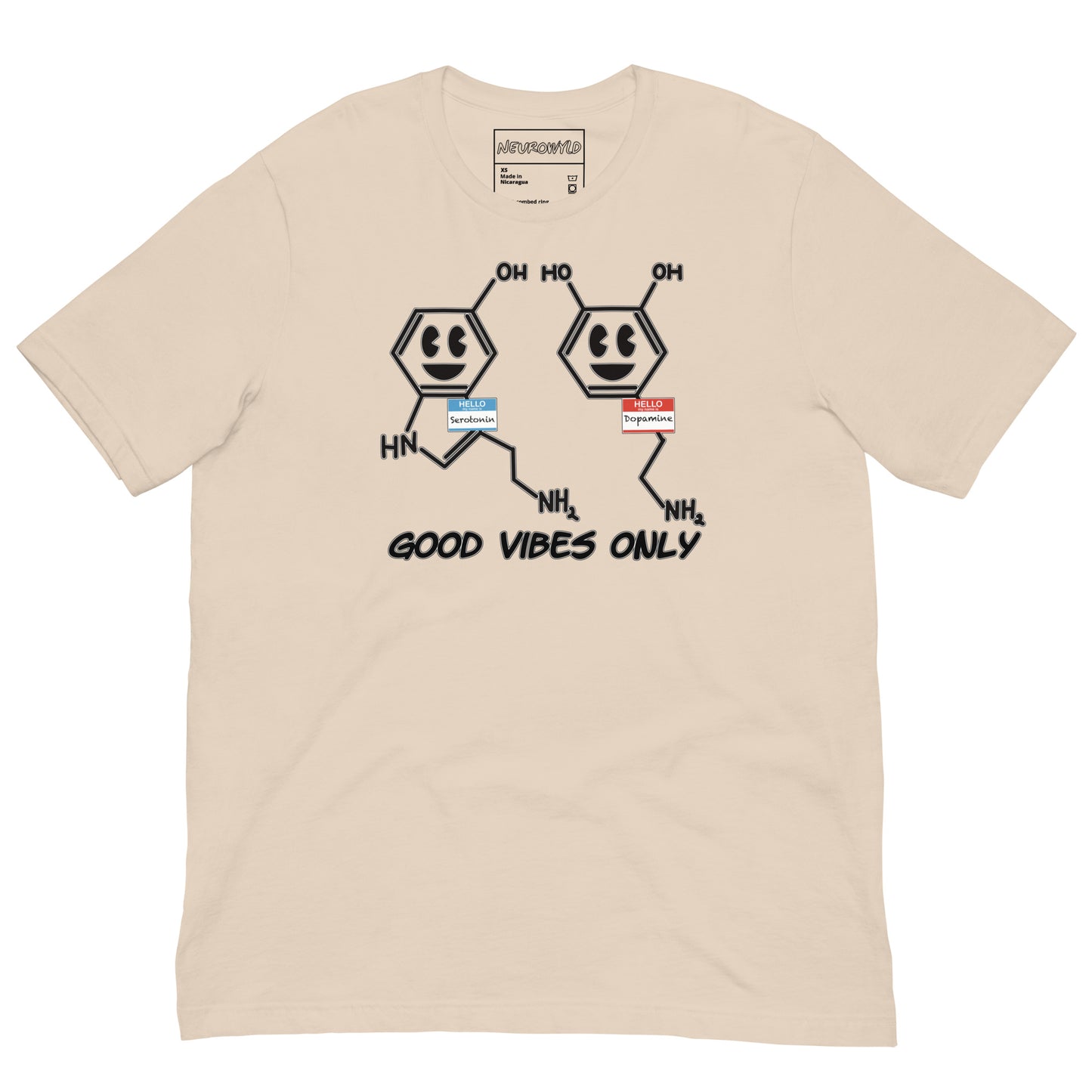 cream t-shirt featuring cartoon serotonin and dopamine molecules with smiling faces and name tags. Below them, bold black text reads 'Good Vibes Only'.