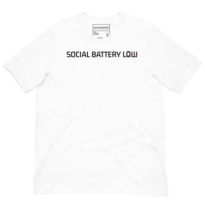 white t-shirt with bold black text reading ‘SOCIAL BATTERY LOW,’ featuring a small red low-battery icon at the end, symbolizing introvert and neurodivergent humor.