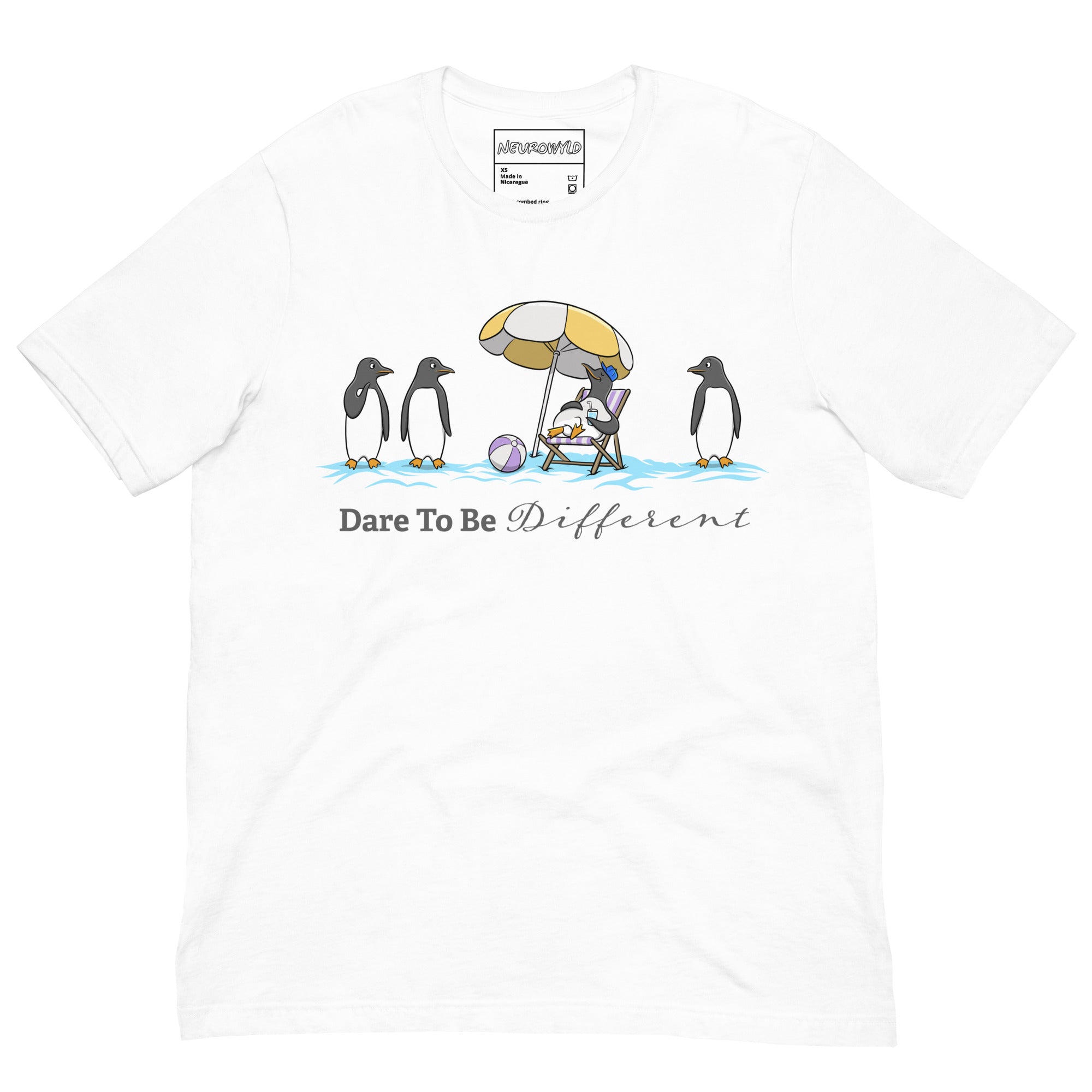 white t-shirt featuring three penguins standing in a row while a fourth penguin lounges under a beach umbrella with a drink, surrounded by sand and a beach ball. Below the illustration, the text reads 'Dare To Be Different' in bold and script font.
