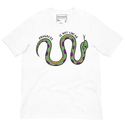 white t-shirt featuring a cartoon snake with green and purple spots, coiled in a wavy shape. Above the snake, the text reads 'Progress Is Not Linear' in black curved lettering.